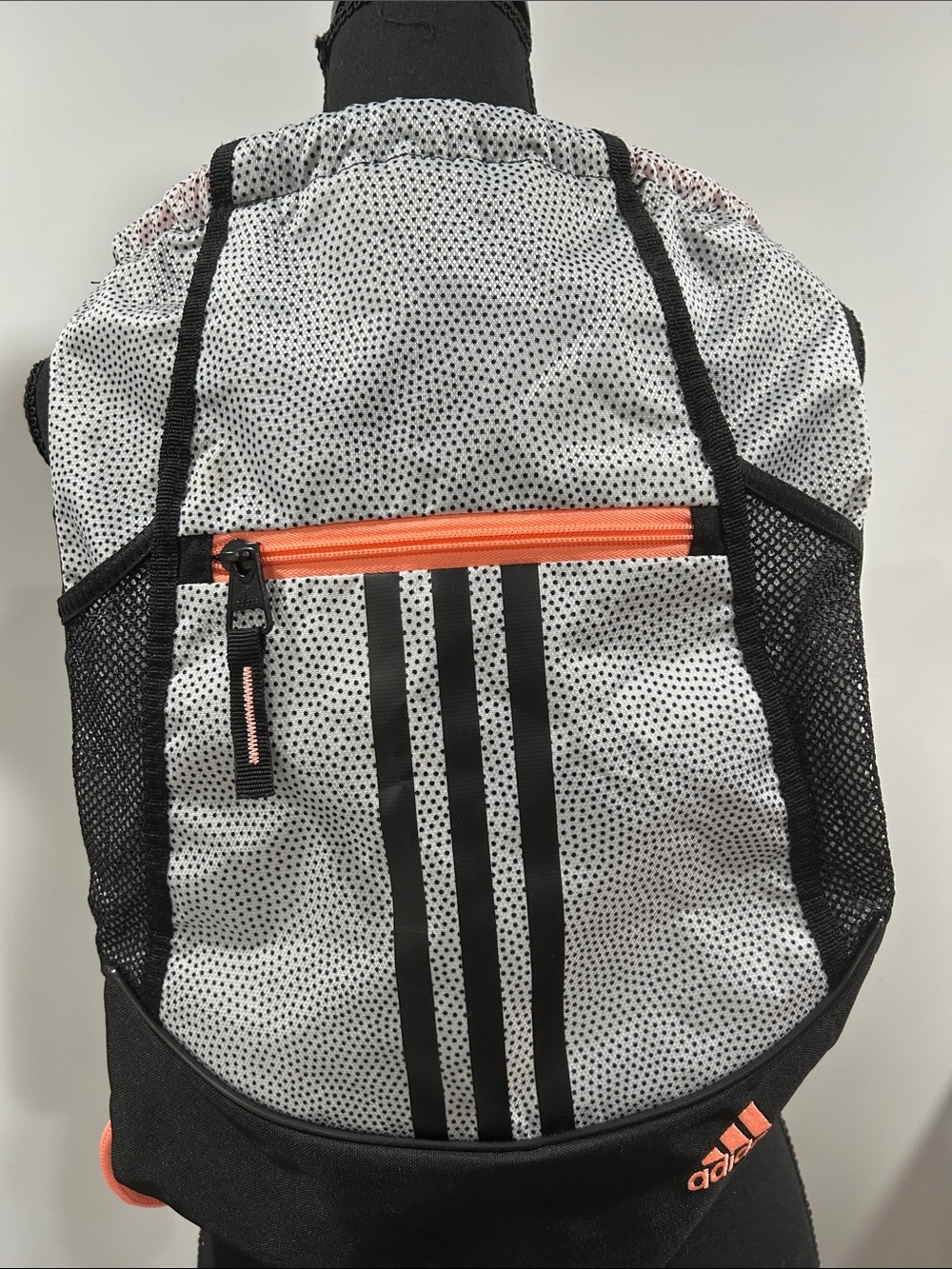 adidas White Black Dot Sling Backpack with Orange Zipper Trim